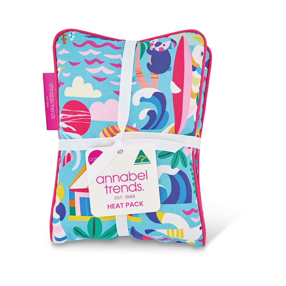 Colorful heat pack with a pattern of waves, clouds, and animals, featuring the brand 'annabel Trends'.