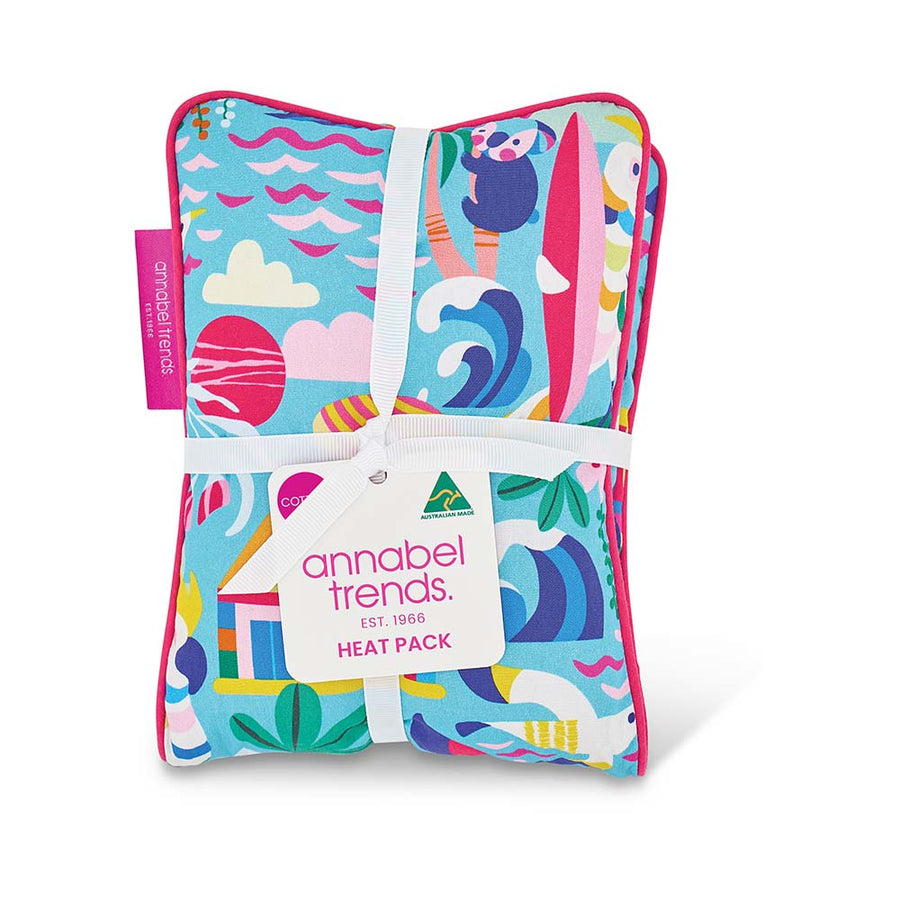 Colorful heat pack with a pattern of waves, clouds, and animals, featuring the brand 'annabel Trends'.