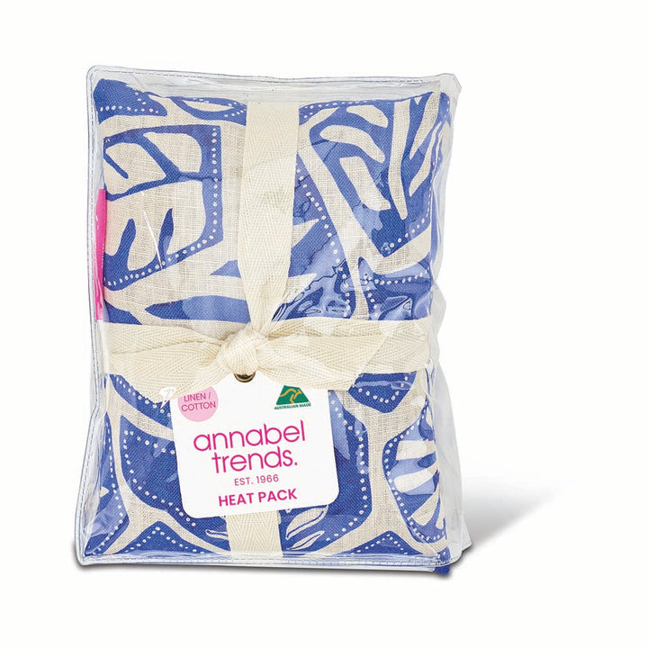 Heat pack with blue and white pattern and 'annabel trends' label on a white background