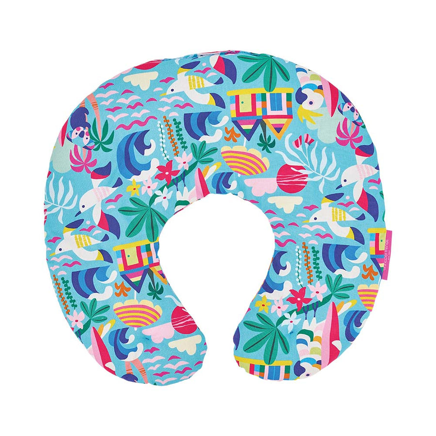 Colourful U-shaped heat pillow with a tropical pattern on a white background