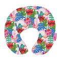Colorful neck pillow with tropical leaf and flamingo pattern on a white background