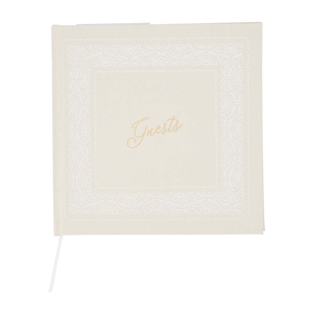 cream guest book with 'Guests' text on a white background