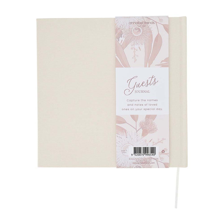 Beige guest book with floral design packaging on a white background