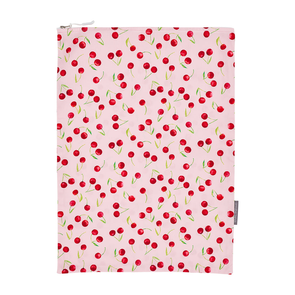 cotton Laundry bag with cherry pattern on a pink background