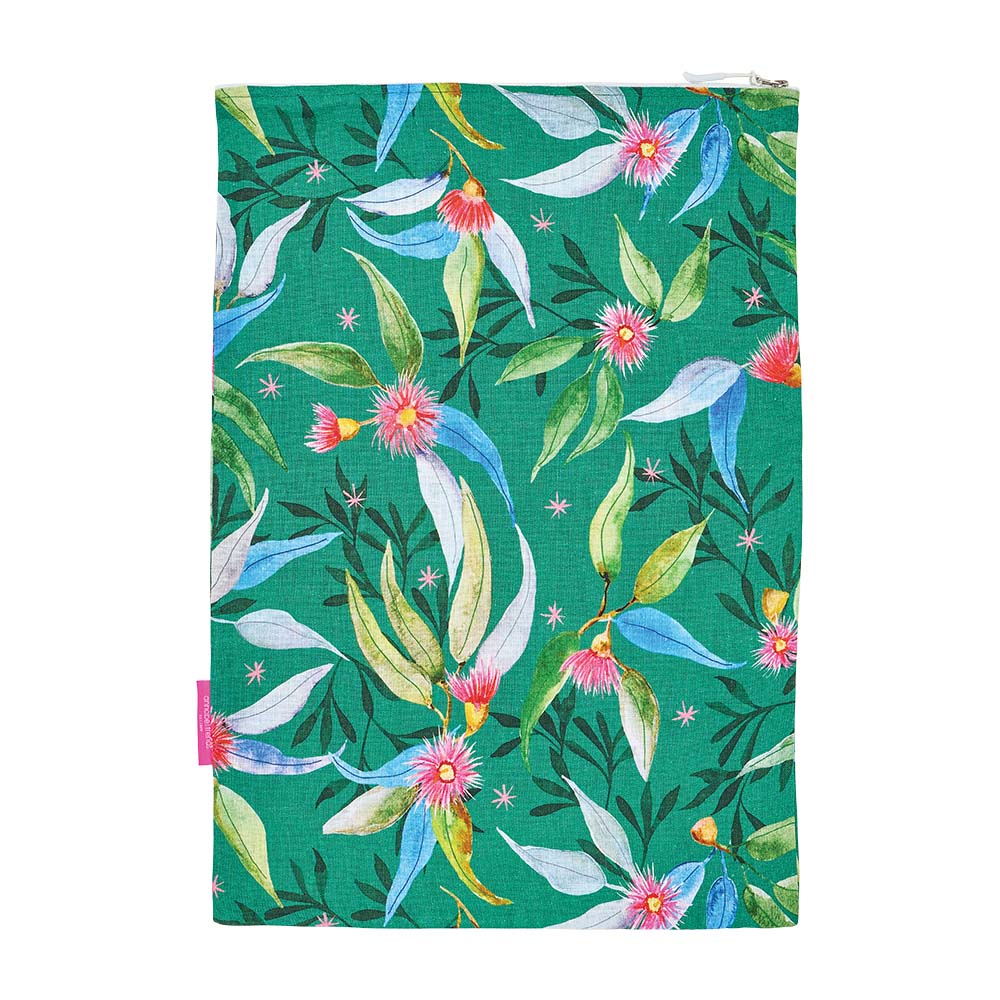 Notebook with floral design on a green background