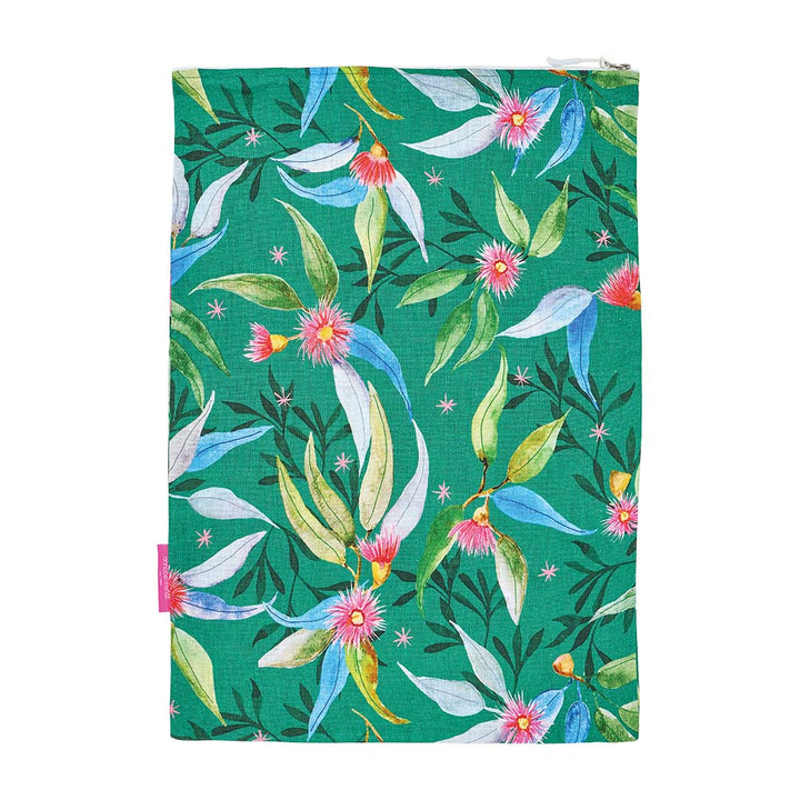 Notebook with floral design on a green background