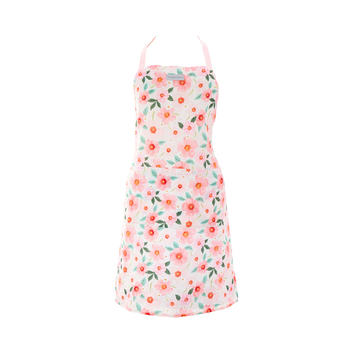 Floral meadow blush apron on a white background