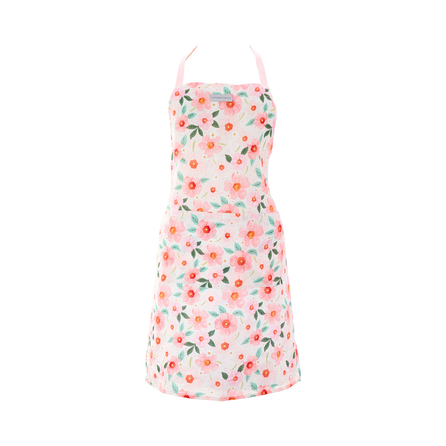 Floral meadow blush apron on a white background