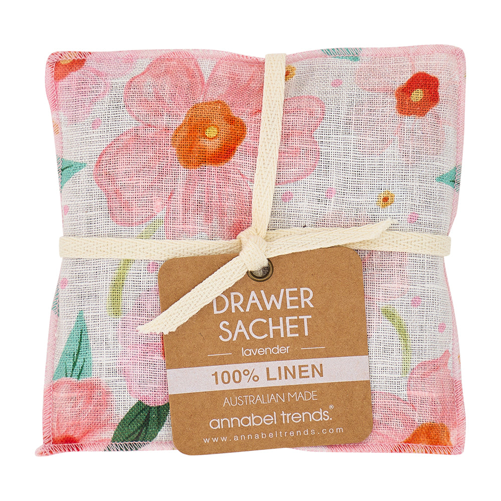 Floral linen drawer sachet with a label on a white background
