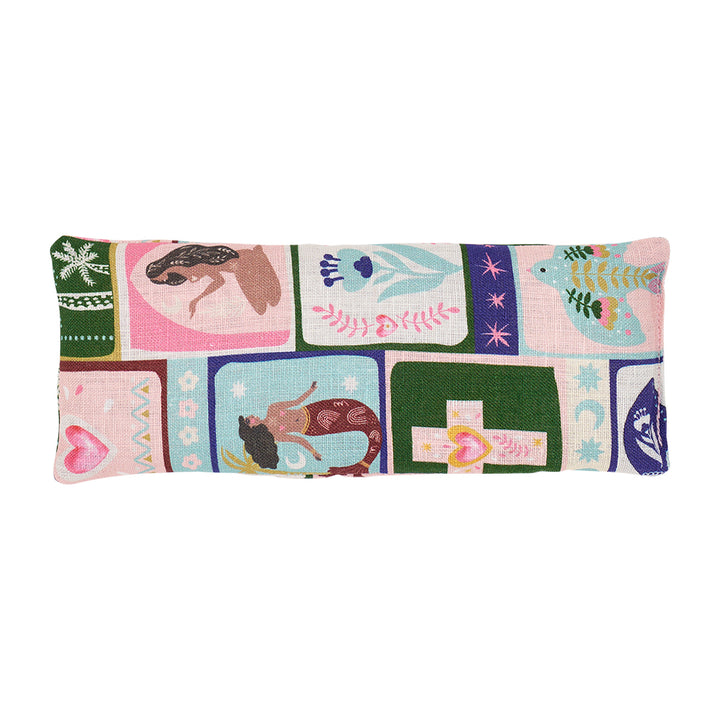Rectangular eye rest pillow with colourful celestial dreams patchwork design on a white background