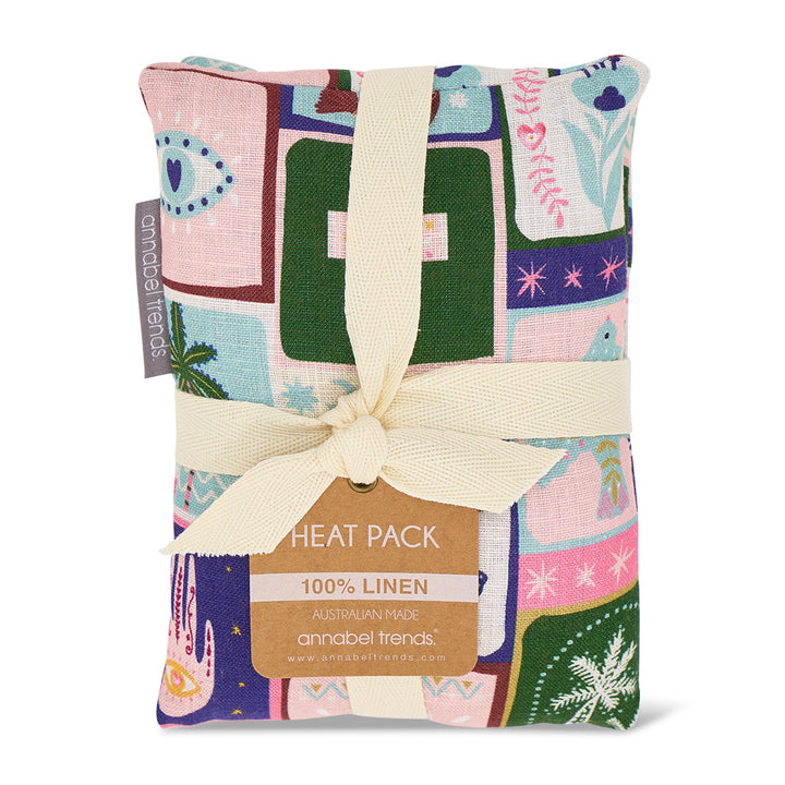 Colorful heat pack with a celestial dreams pattern and a visible brand label on a white background