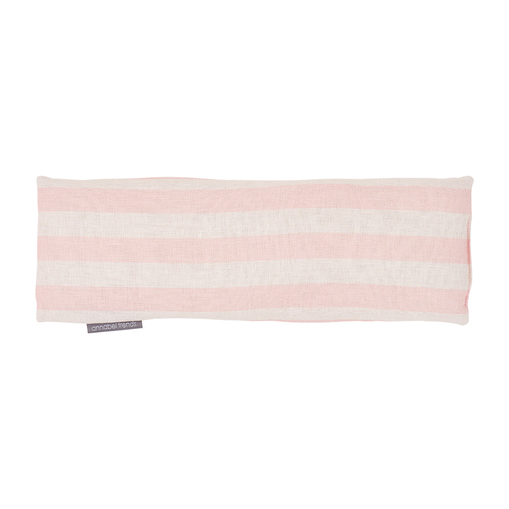 Pink and white striped linen heat pillow on a white background