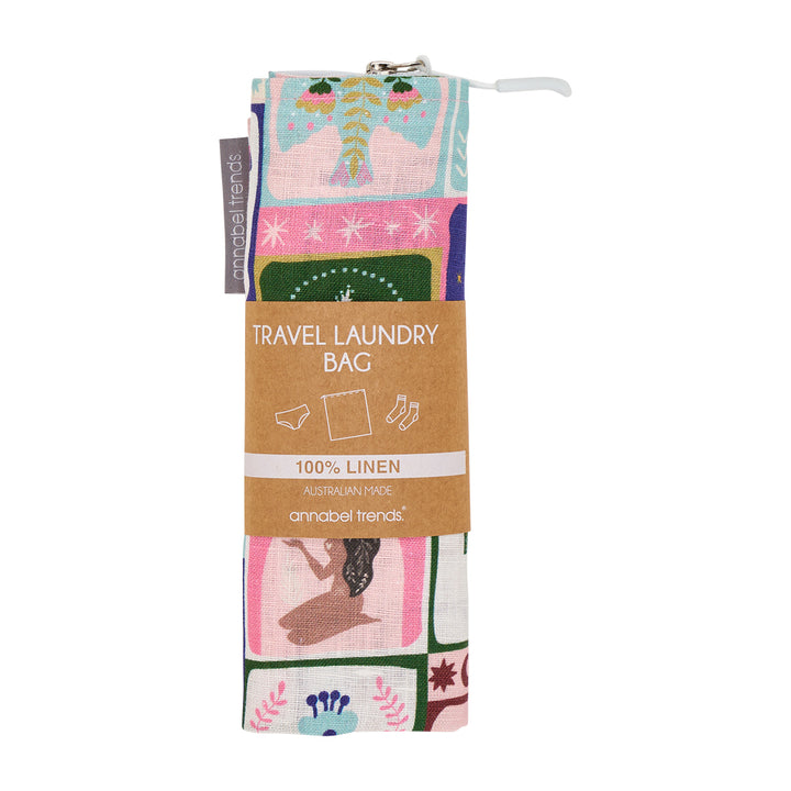 Travel laundry bag with colourful celestial dreams design and packaging on a white background