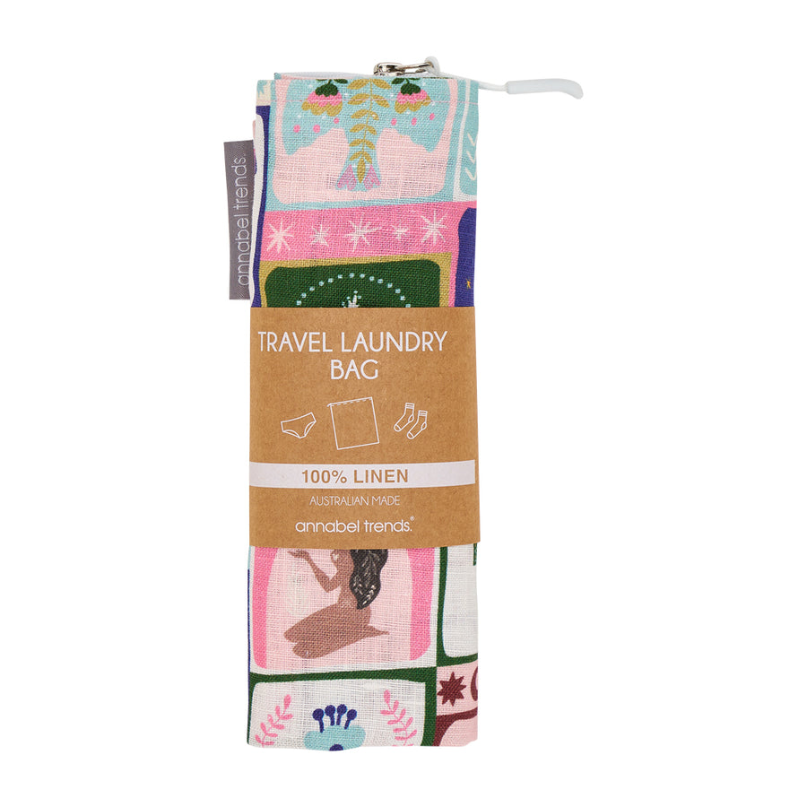 Travel laundry bag with colourful celestial dreams design and packaging on a white background
