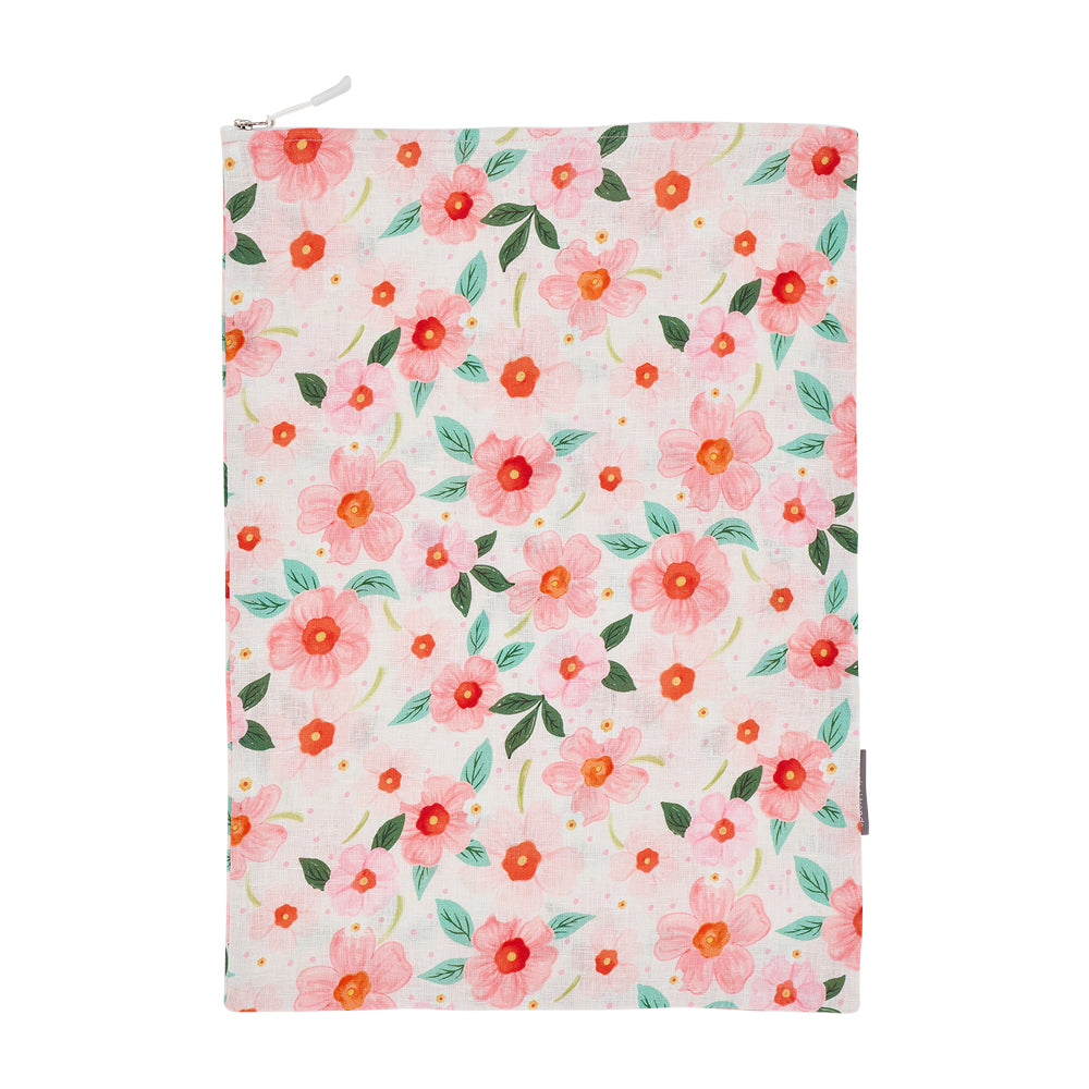 Floral patterned travel laundry pouch with a zipper on a white background