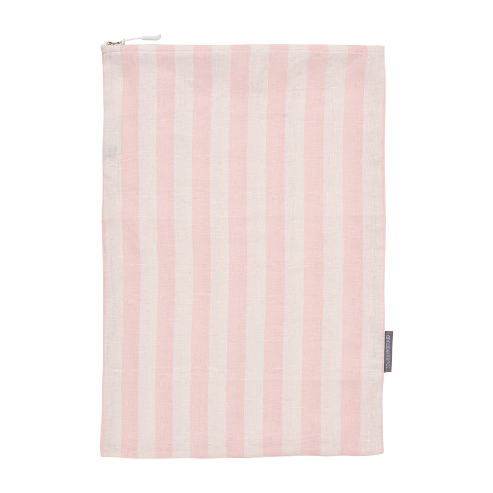 Pink and white striped linen laundry bagwith a zipper on a white background