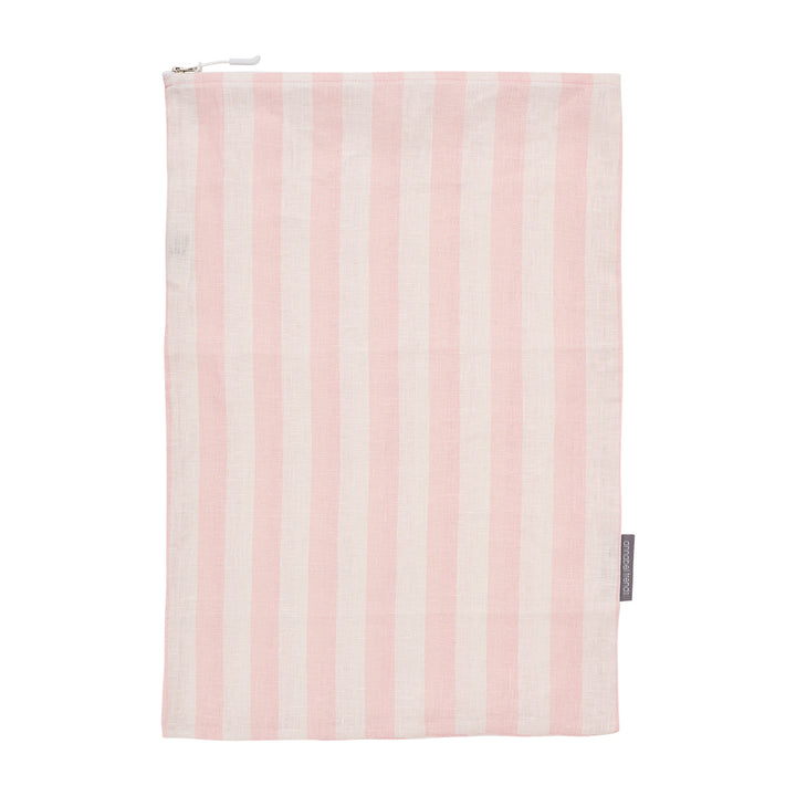 Pink and white striped linen laundry bagwith a zipper on a white background