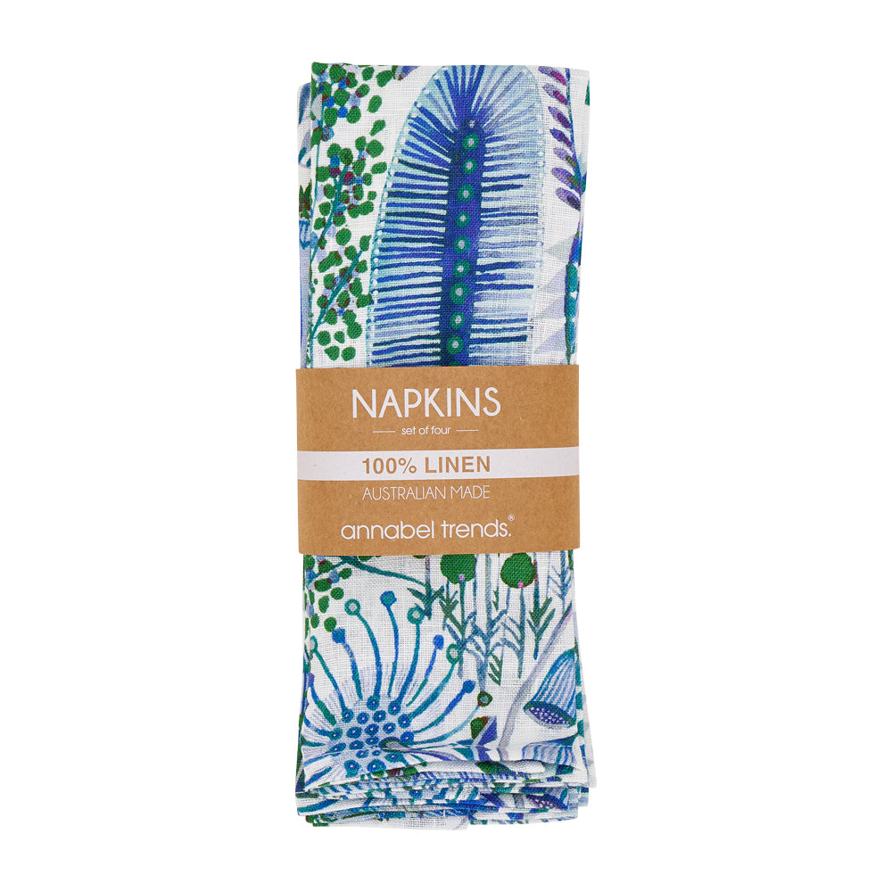 Pack of linen napkins with a floral bush botanical design and 'Annabel Trends' branding.