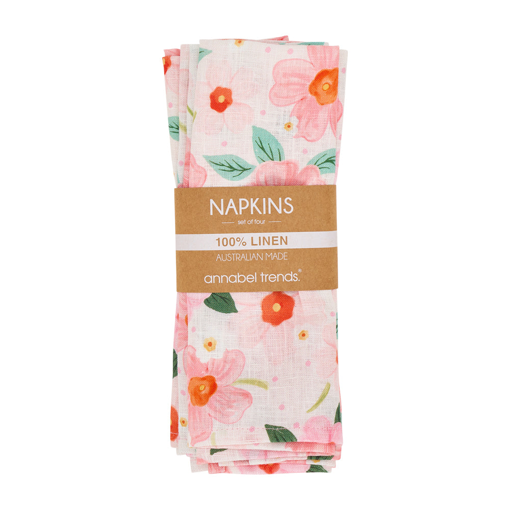 Pack of floral napkins with a visible brand label on a white background