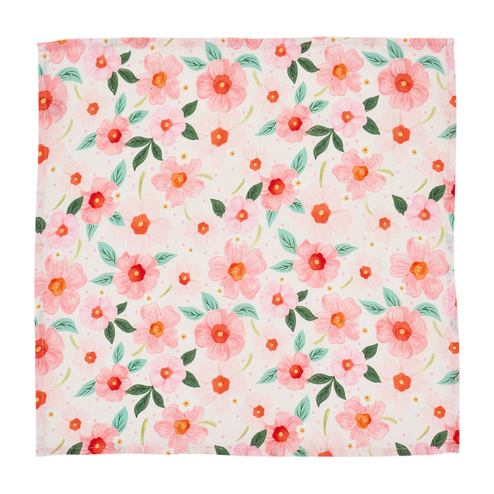 Floral pattern napkin with pink flowers and green leaves on a white background