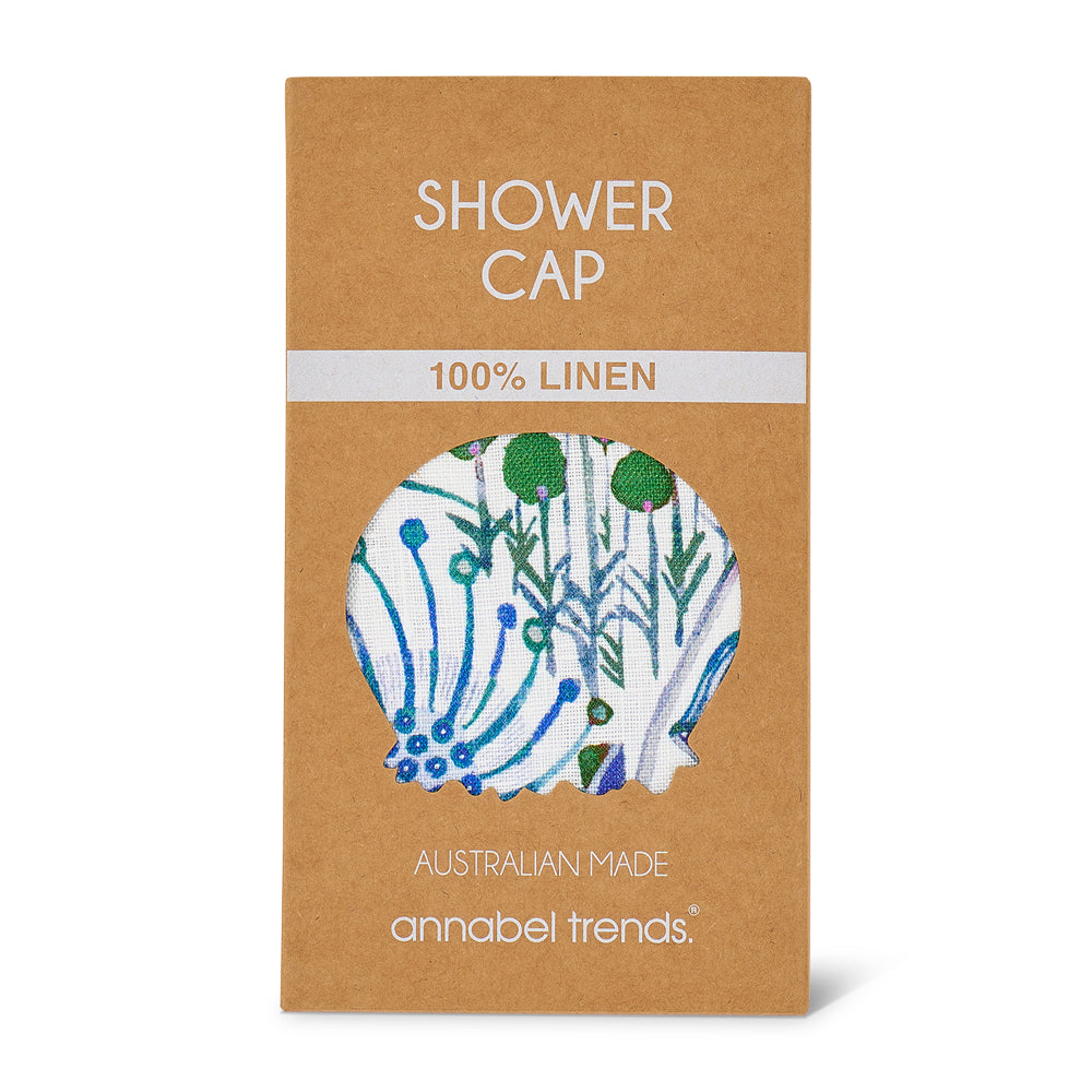 Packaging of a shower cap with linen design on a brown background