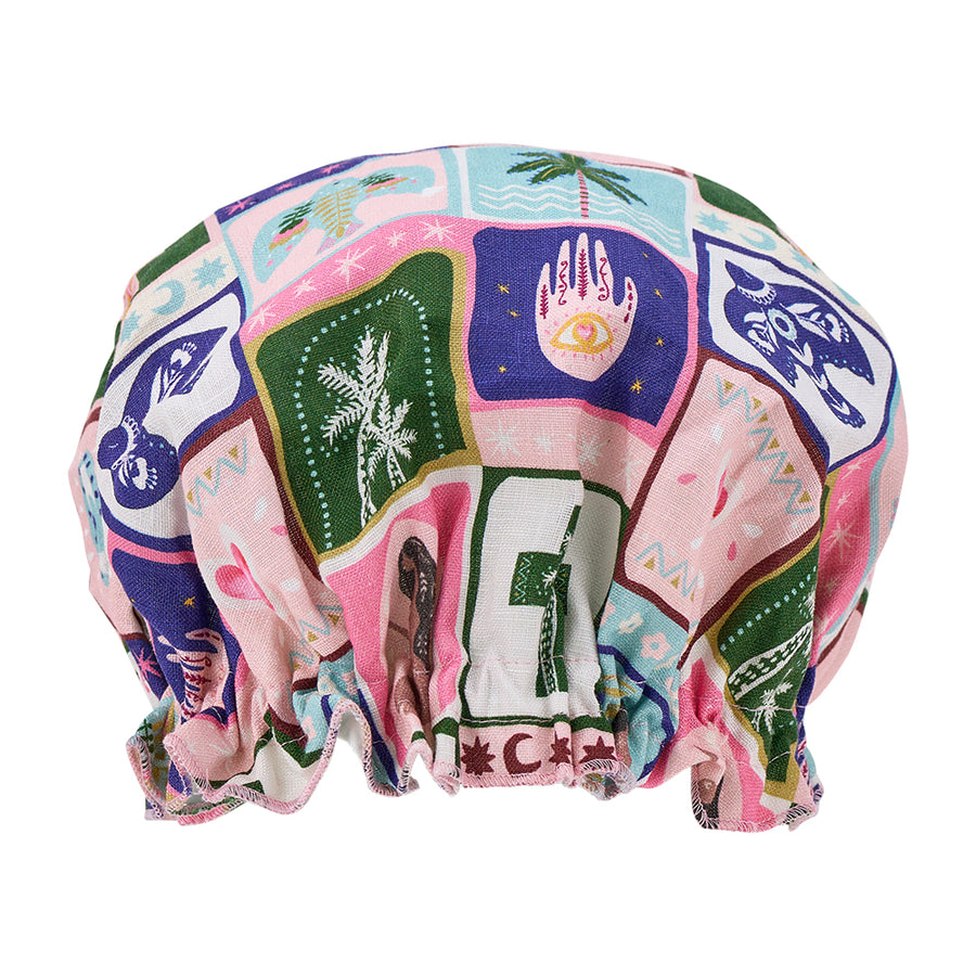 Colourful celestial dreams  shower cap with abstract designs on a white background