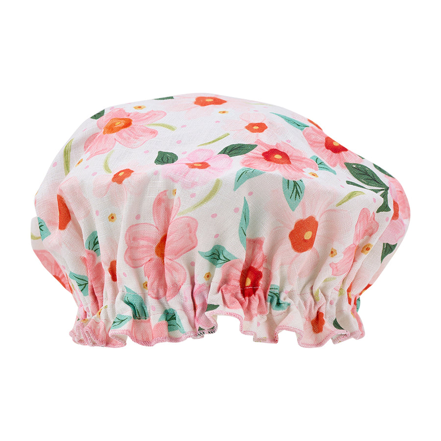 Floral-patterned shower cap on a white background