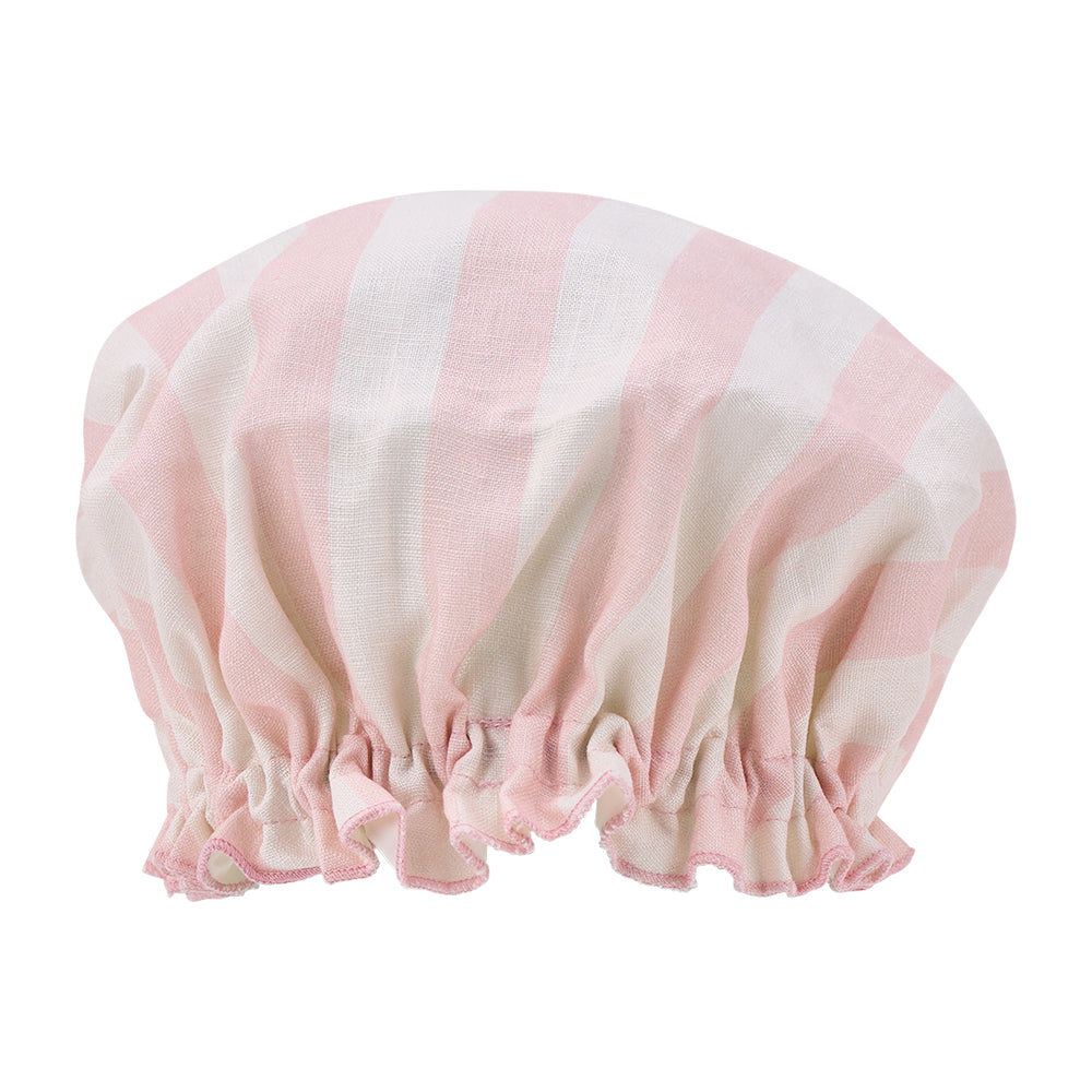 Pink and white striped shower cap on a white background