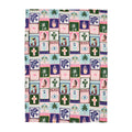 Patterned fabric with various celestial symbols and designs on a white background