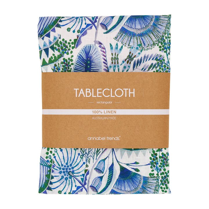 Linen Tablecloth with Bush botanical print with floral design and brown label on a white background
