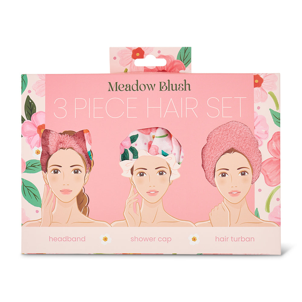 Meadow Blush 3-piece hair care set packaging with illustrations of a headband, shower cap, and hair turban.