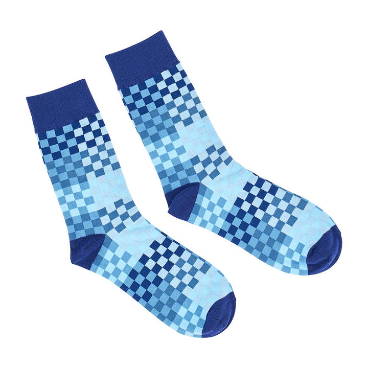 Pair of blue checkered socks on a white background