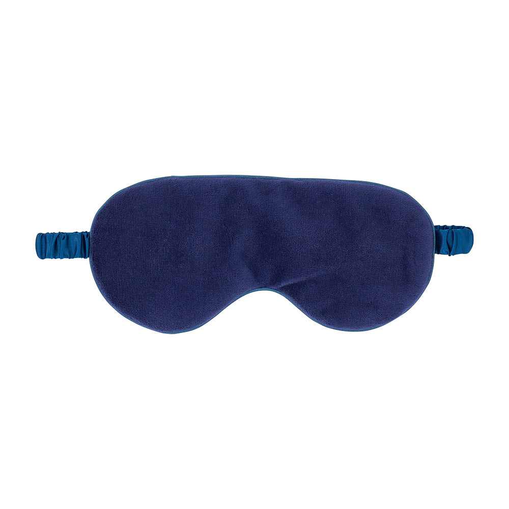 Navy blue sleep mask on a white background