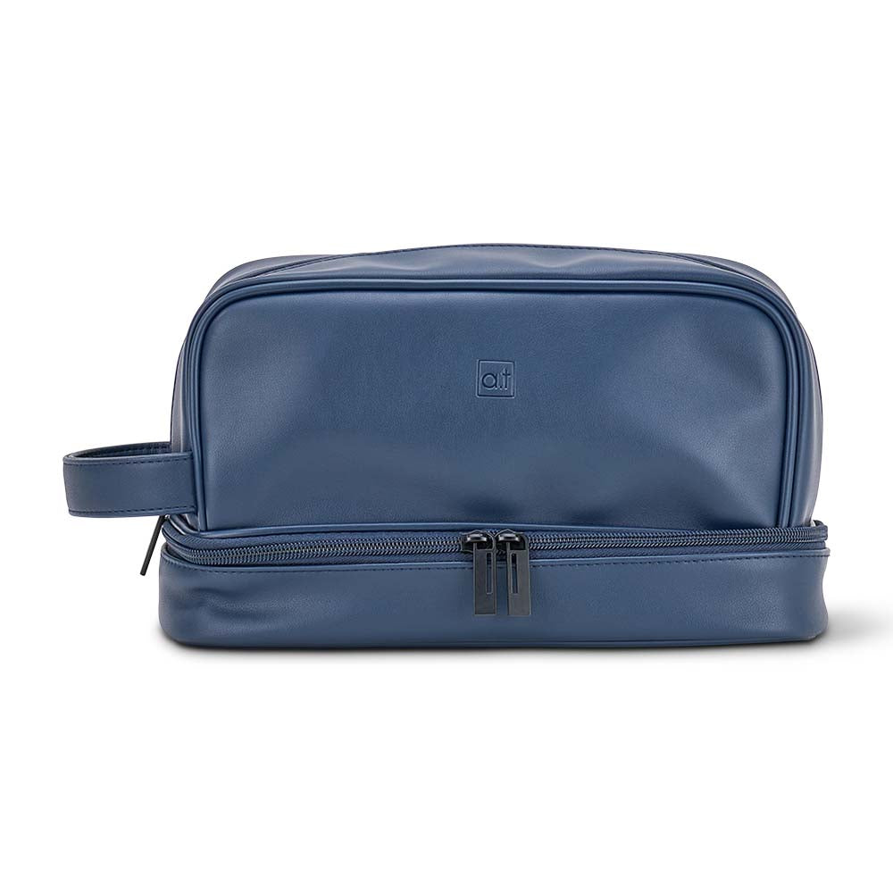 Blue toiletry bag with a handle on a white background