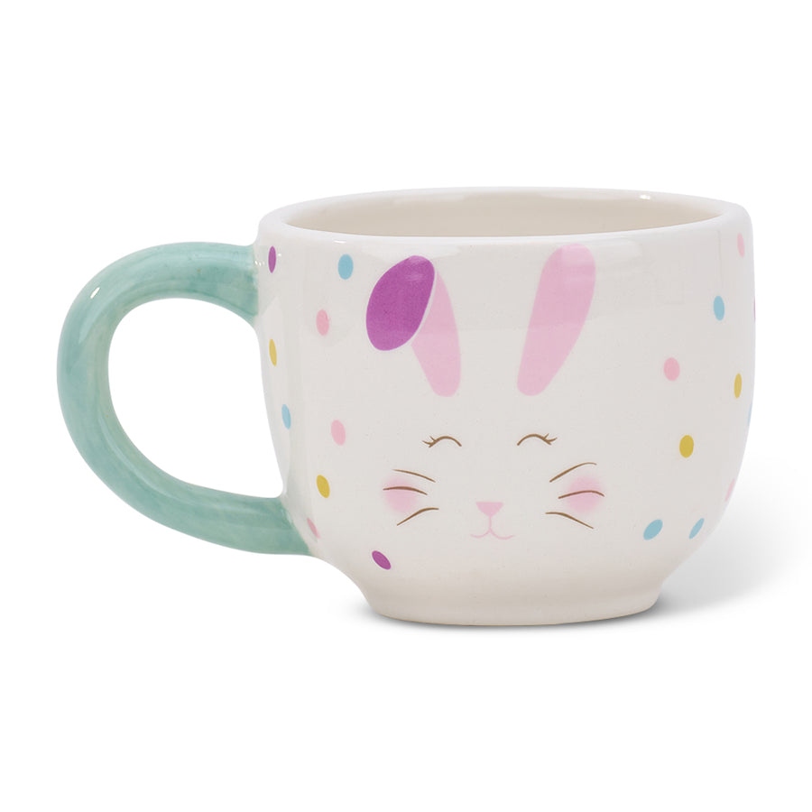 Ceramic mug with bunny design on a white background
