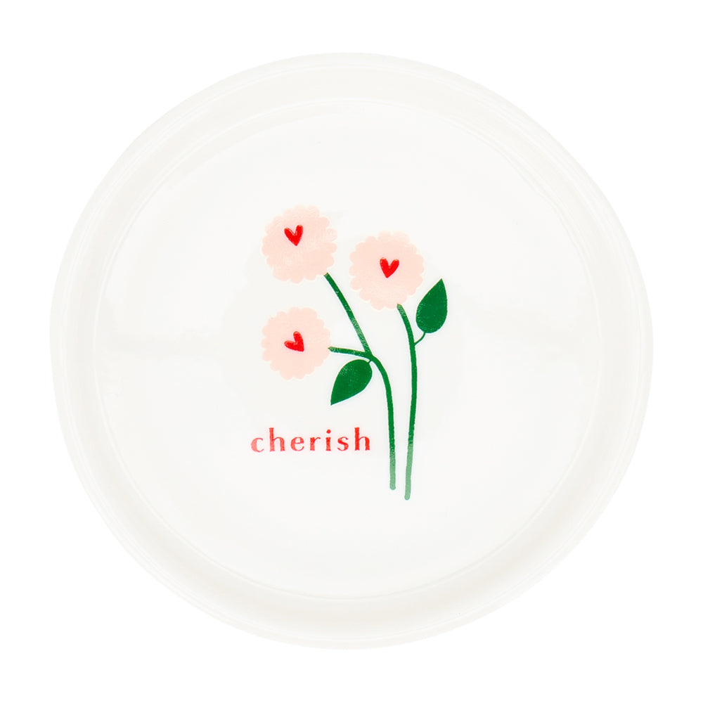 Decorative plate with floral design and 'cherish' text on a white background