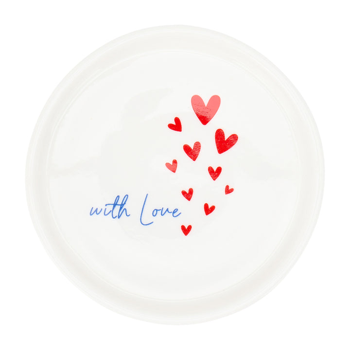 White plate with red hearts and 'with Love' text on a white background