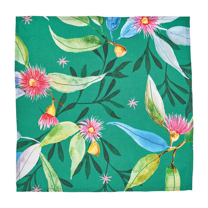 Festive green fabric with pink flowers and green leaves on a green background