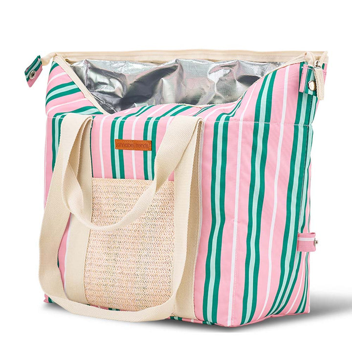 Striped cooler bag with a straw handle on a white background
