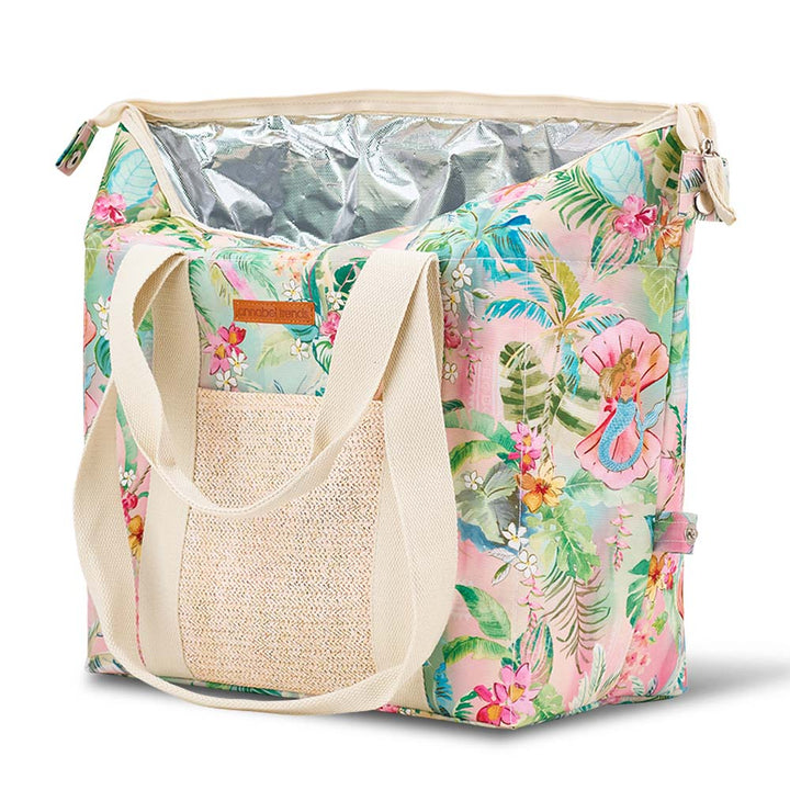 Floral-patterned cooler bag with a straw handle on a white background