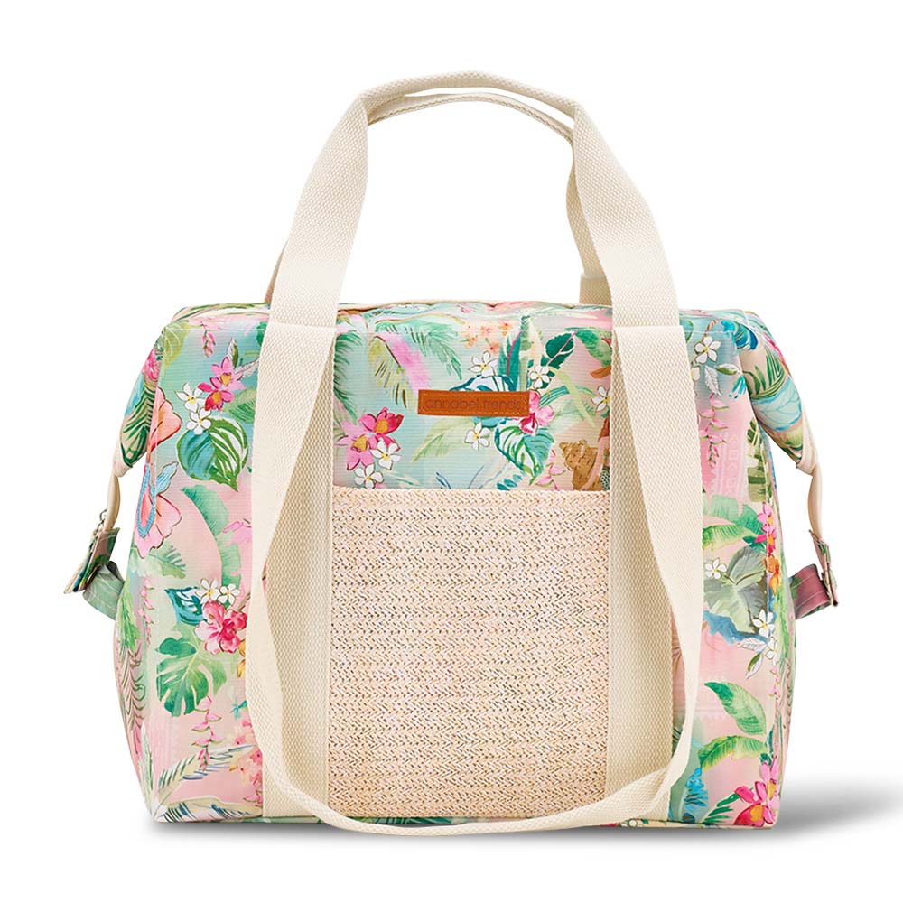 Floral patterned bag with a straw section on a white background