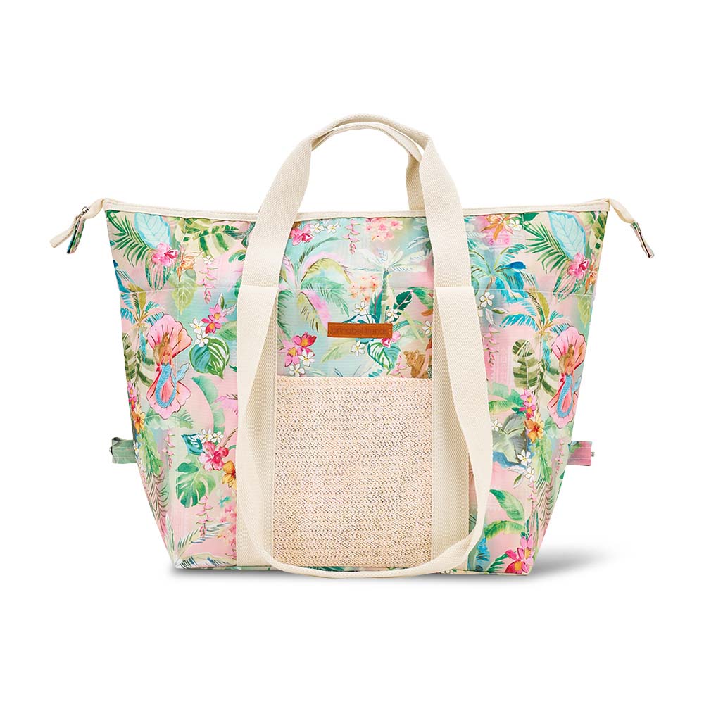 Tropical floral patterned tote bag with straw detail on a white background