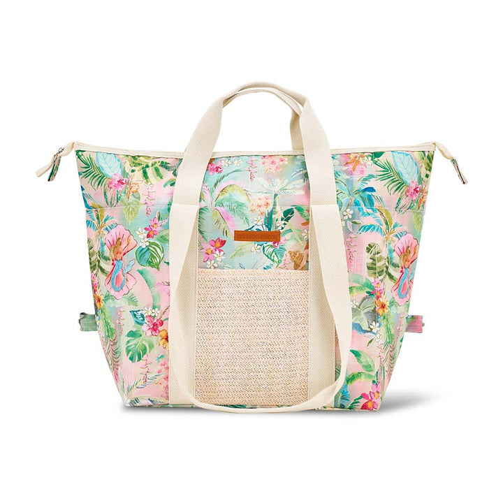 Tropical floral patterned tote bag with straw detail on a white background