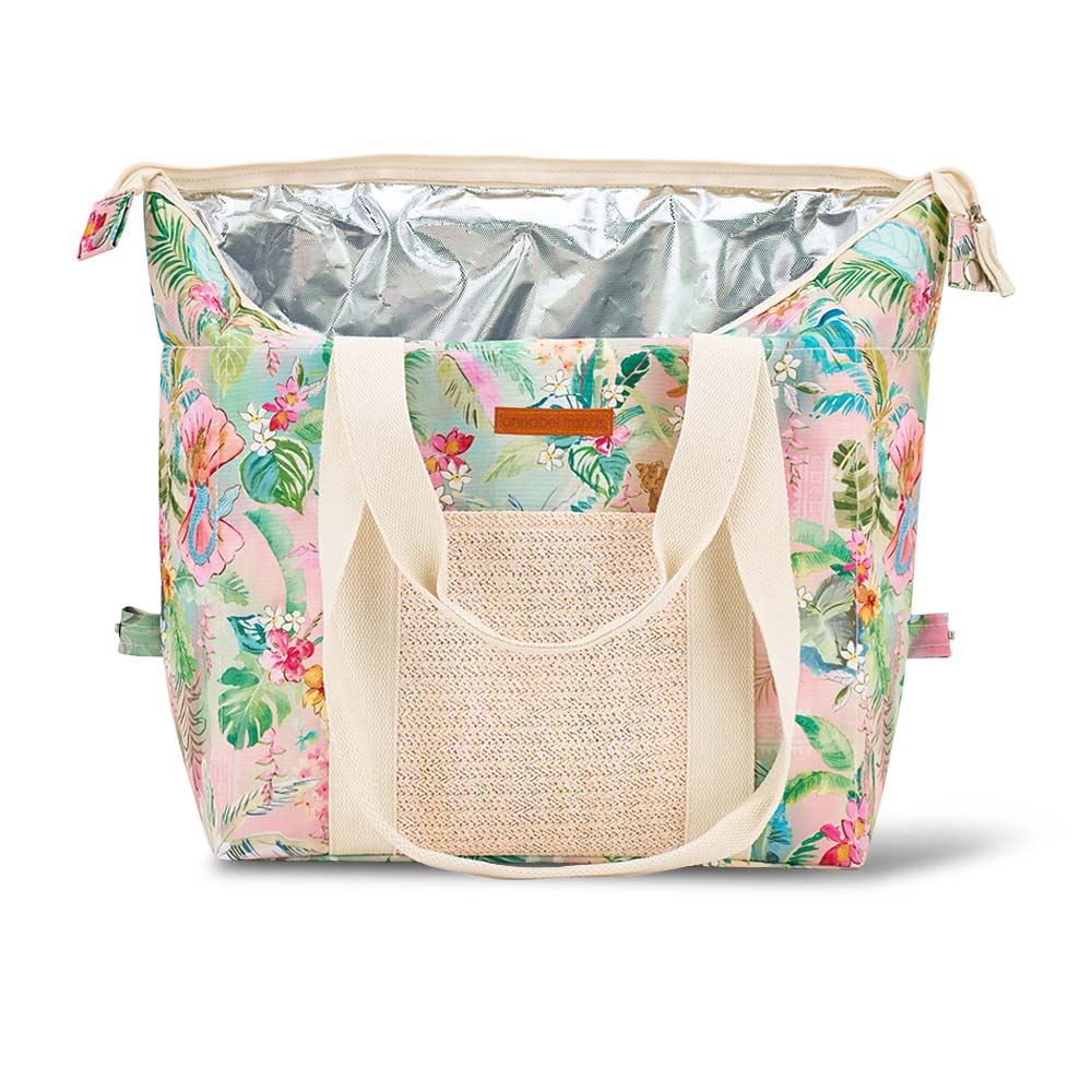 Floral-patterned cooler bag with a straw handle on a white background