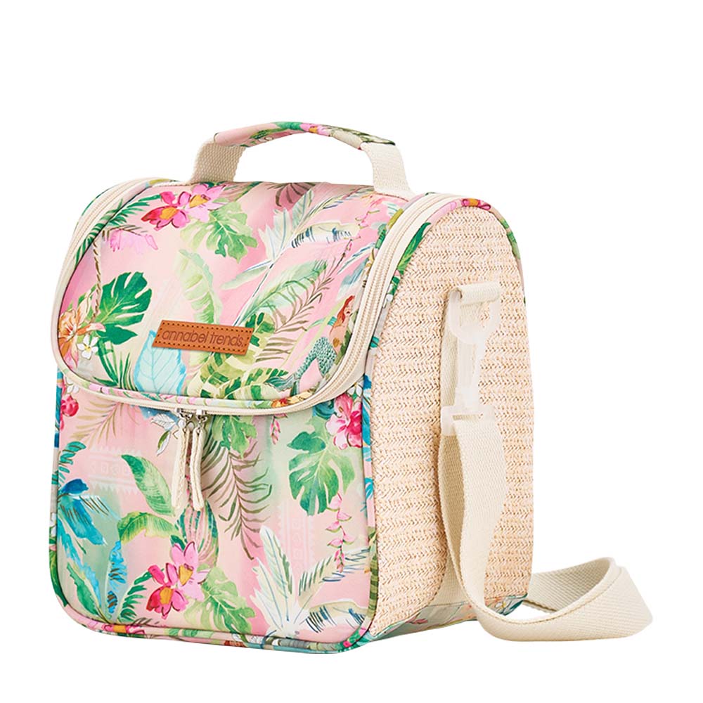 Floral-patterned lunch bag with a straw shoulder strap on a white background
