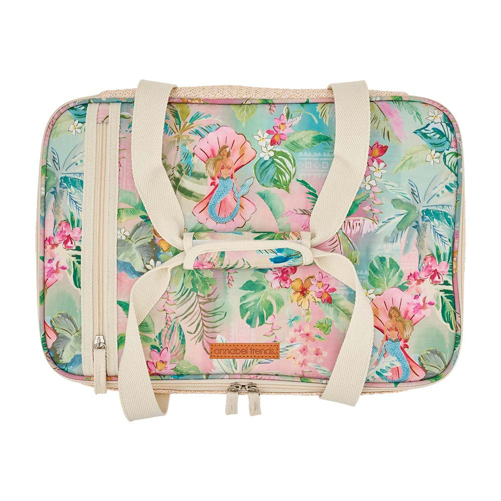 Floral patterned bag with straps on a white background