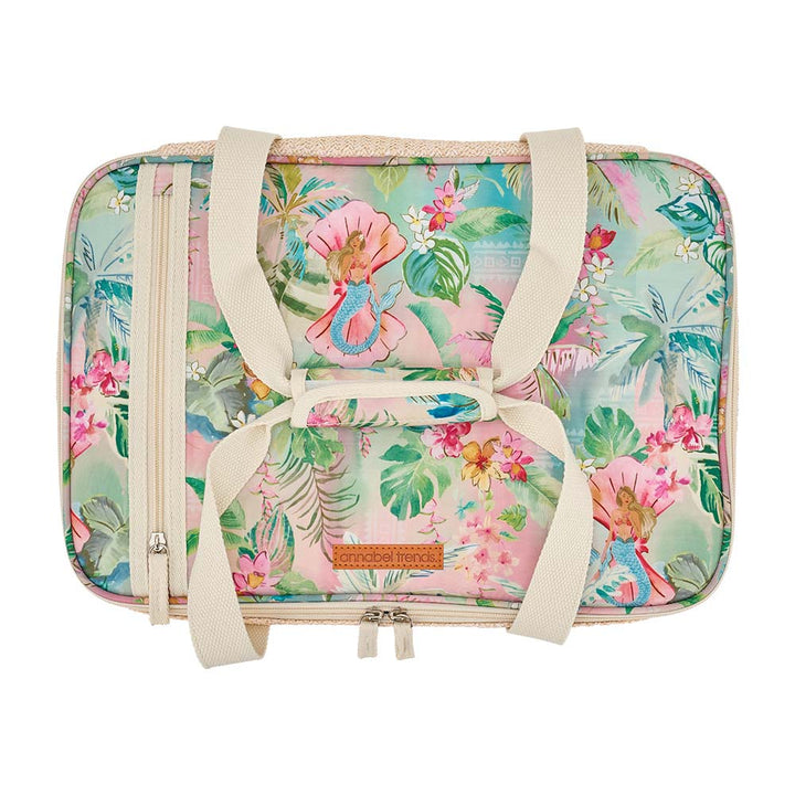 Floral patterned bag with straps on a white background