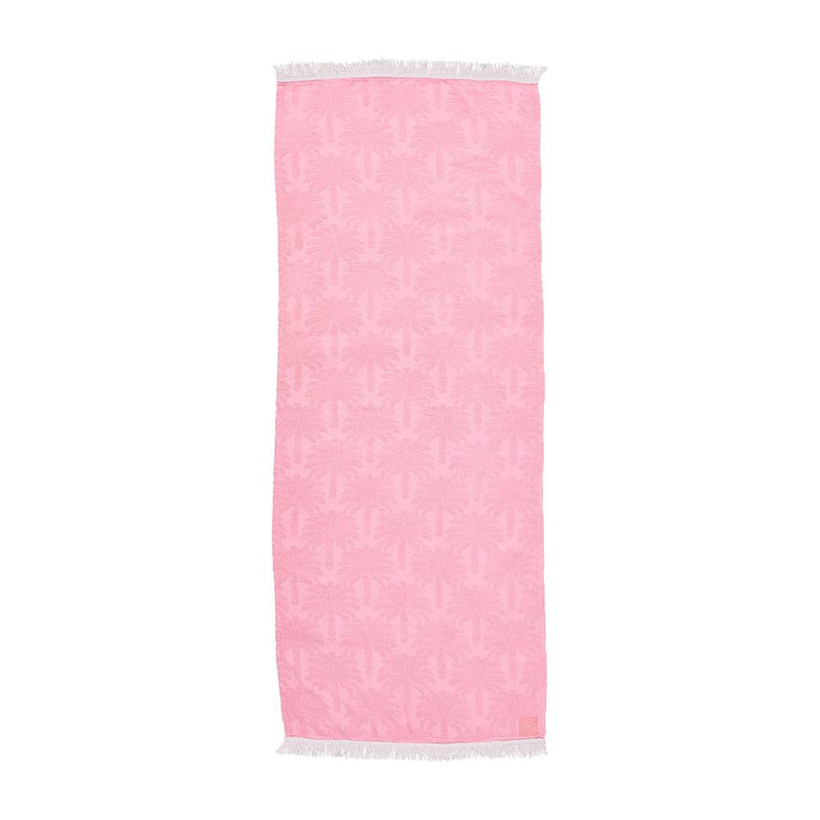 Pink towel with white border on a white background