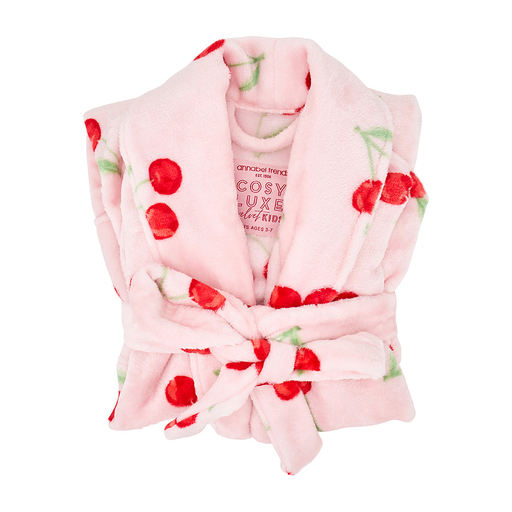 pink kids bath robe with red cherries folded
