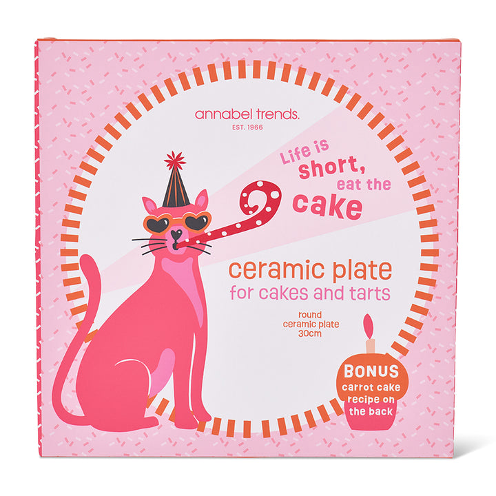 ceramic serving plate for cakes and tarts with pink cat blowing a party whistle and the words life is short, eat the cake in its box